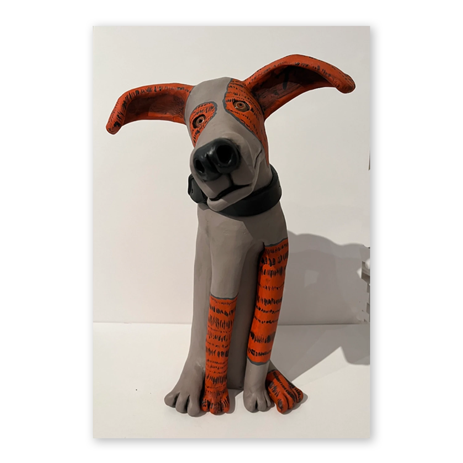 Orange & Grey Dog with Black Collar